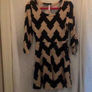 Patterned beige and black holiday dress